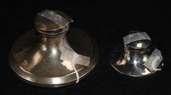 Two silver capstan inkwells (a.f.).